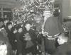 Christmas with American servicemen at Seething air base. (Image MC 371/912, Norfolk Record Office.)