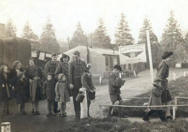 Norfolk children queue up to see Santa Claus at an American air base, Christmas 1944. (Image MC 376/350, Norfolk Record Office.)