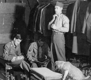 From the left, radio operator William D Mercer, tail gunner James D Cowan and gunner George W Foster with Luke the dog. Picture from Ted's Travelling Circus by Cal Stewart.