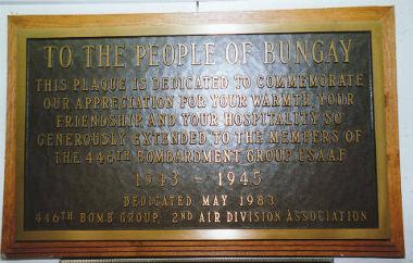 The bronze plaque, mounted on English oak, that was presented by the 446th Bomb Group Association to the people of Bungay in May 1983. It hangs in Bungay Community Centre, a former forces rest room.