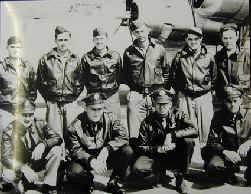 Crew photo, including Charley V Neely, George R Locke, Arthur G Hamilton, Earl Abke, A Conway, Wallace E Habenicht, Ralph L Miller, Ray M Ashba, Frank Hanzalik, and Darrell A Boucher. From the collection of Frank Hanzalik (MC 376/287 816x1) at NRO