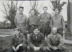 Men from the 733BS Armament Shop, including Bill Talbot, Walt Sowa, ? Keeney, John Eagleton, Bob Hoeft, ? Dicamillo and Walt Edgeworth. The picture is from an anonymous donor's collection (MC 371/365 720x6) held at Norfolk Record Office.