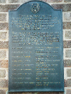 The memorial set into the wall of a block of flats in Heigham Street, Norwich. This is in memory of the crew of a 753rd Bomb Squadron aircraft, who were killed in a crash at nearby Barker Street in November 1944.