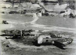 Witchcraft on her hardstand, next to farm buildings. Picture taken from the Peter Bond Scrapbook Vol 1 at Norfolk Record Office.