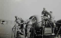 Maintenance on a B-24 at Rackheath. Picture taken from the Peter Bond Scrapbook Vol 1 at Norfolk Record Office.